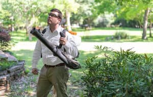 pest control specialist spraying for ticks